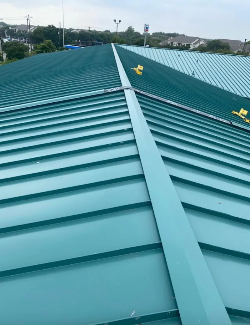 Green commercial metal roof ridge and valley for Metal Roof Repair in Holladay