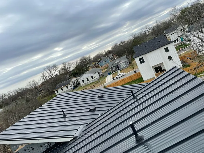 Standing seam metal roof panels with vents for Skylight Repair in Holladay